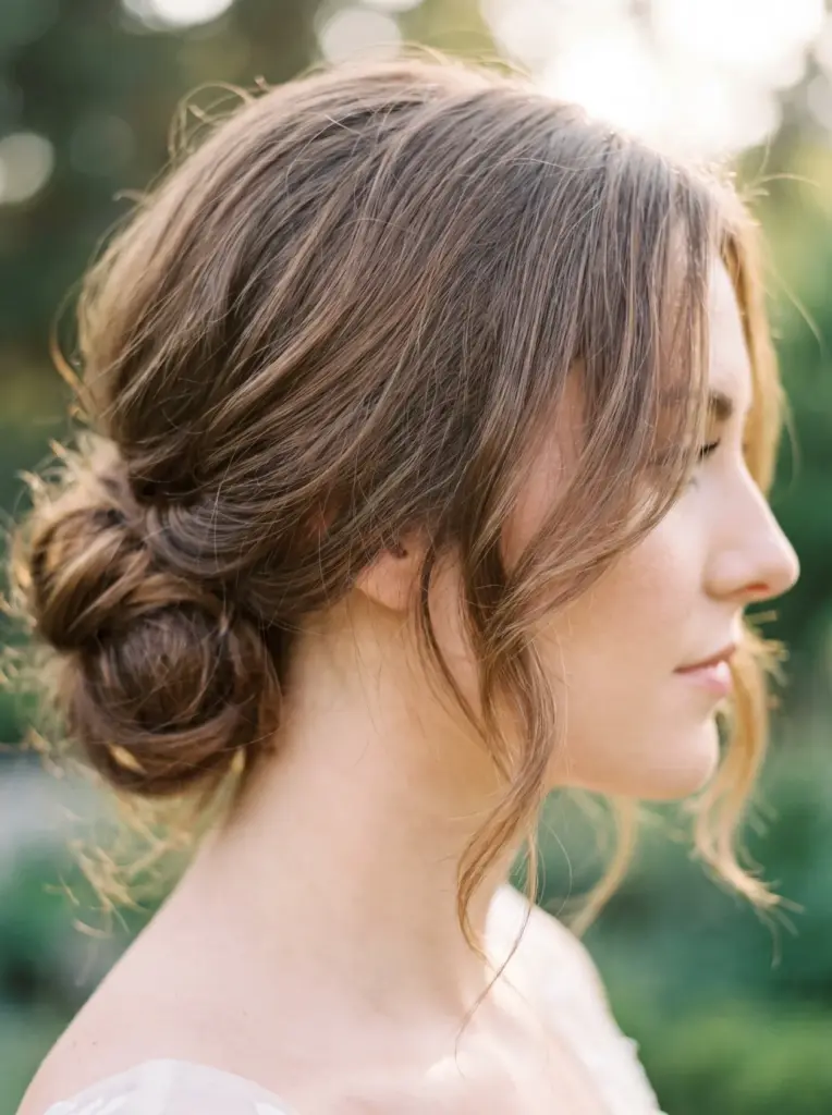 Low Bun With Face-Framing Layers