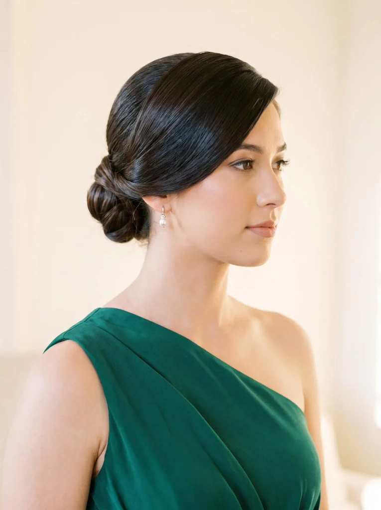 Side Part Sleek Low Bun
