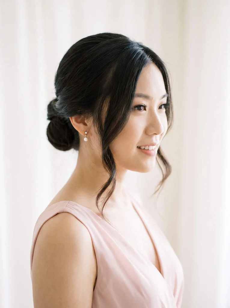 Soft Face-Framing Low Bun Prom