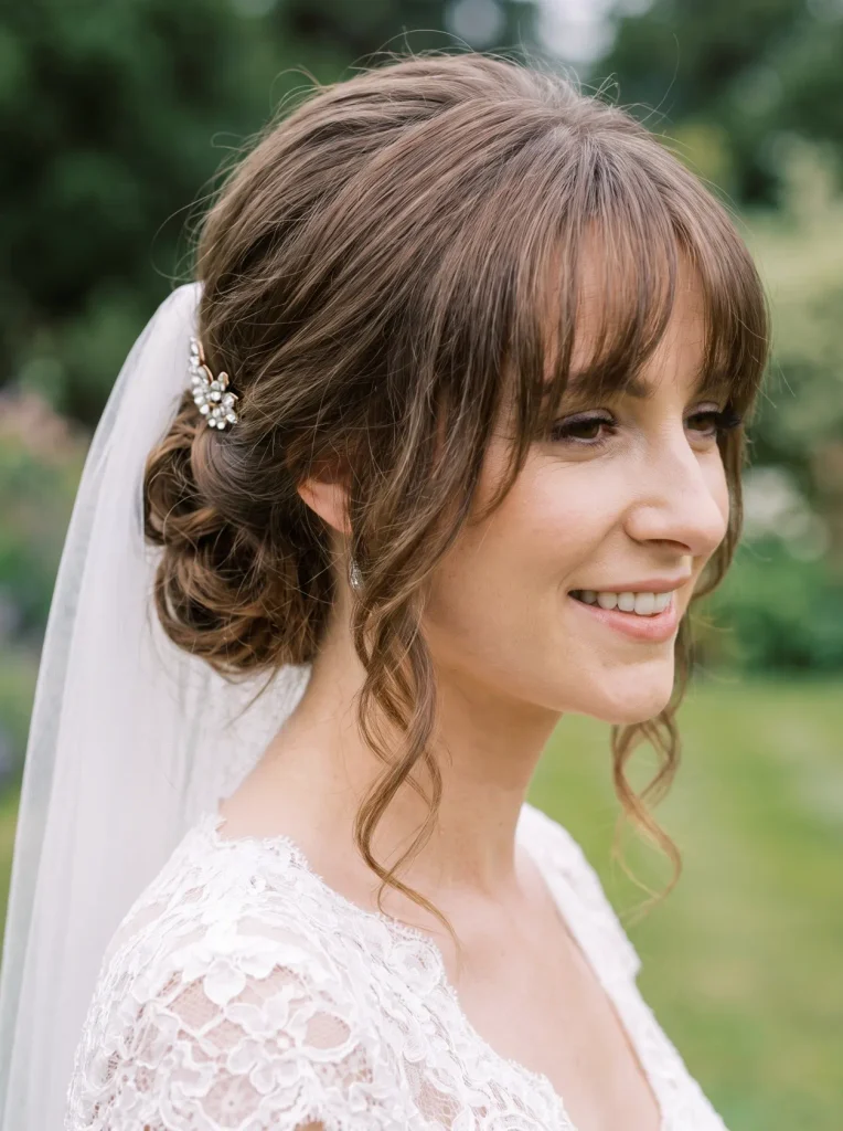 Wispy Bangs Low Wedding Bun